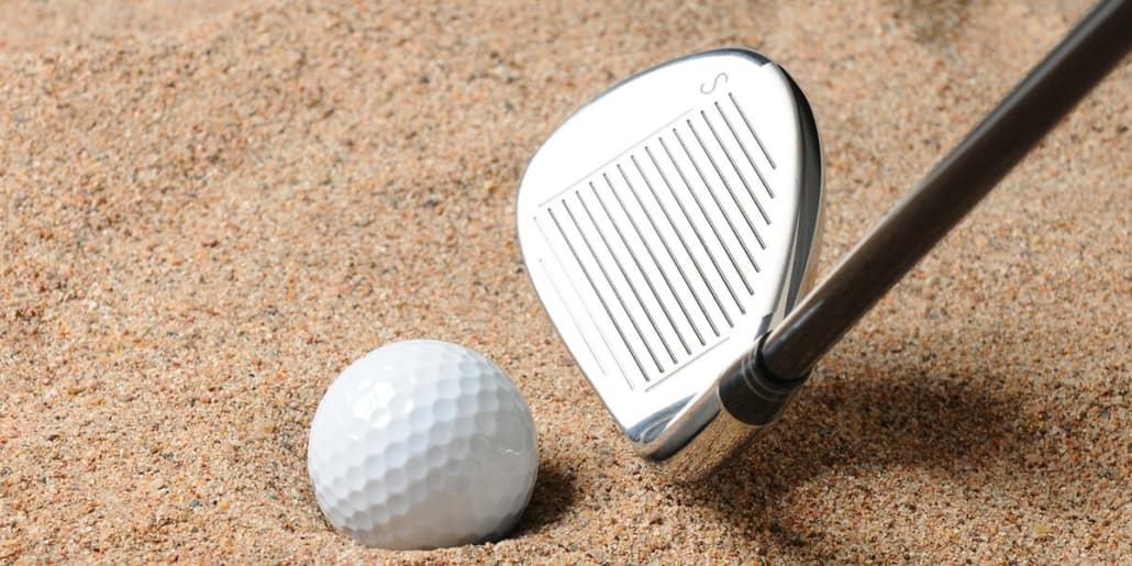 sand wedges with a ball in a sand